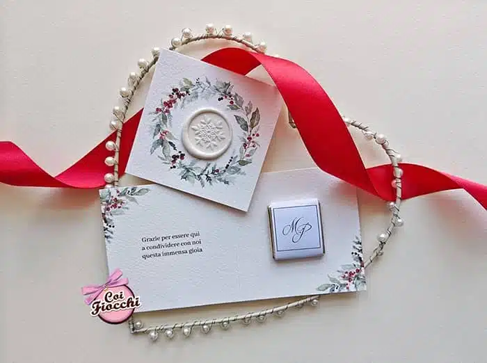 segnaposto tema natalizio con ceralacca e cioccolatino